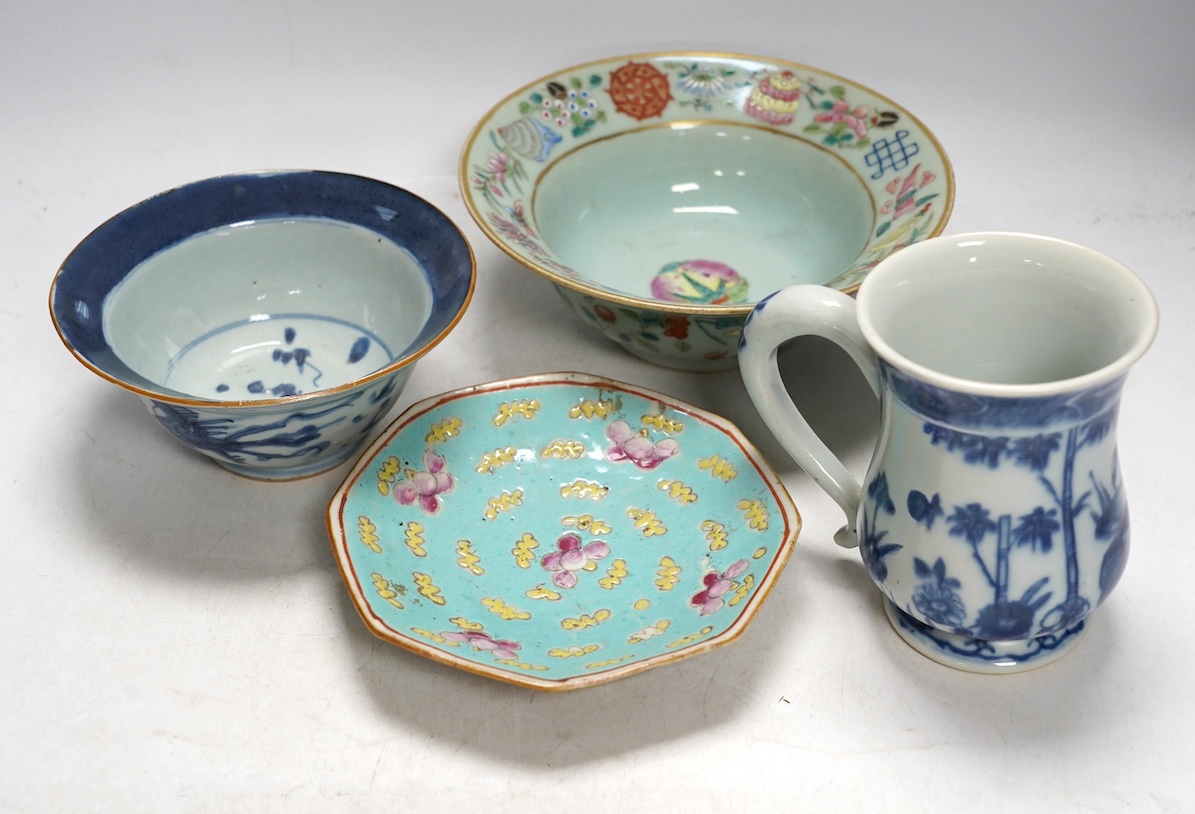 A Chinese blue and white Ming dynasty bowl, a blue and white mug and two pieces of famille rose (4), tallest 12cm. Condition - good